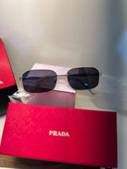 PRADA GLASSES
